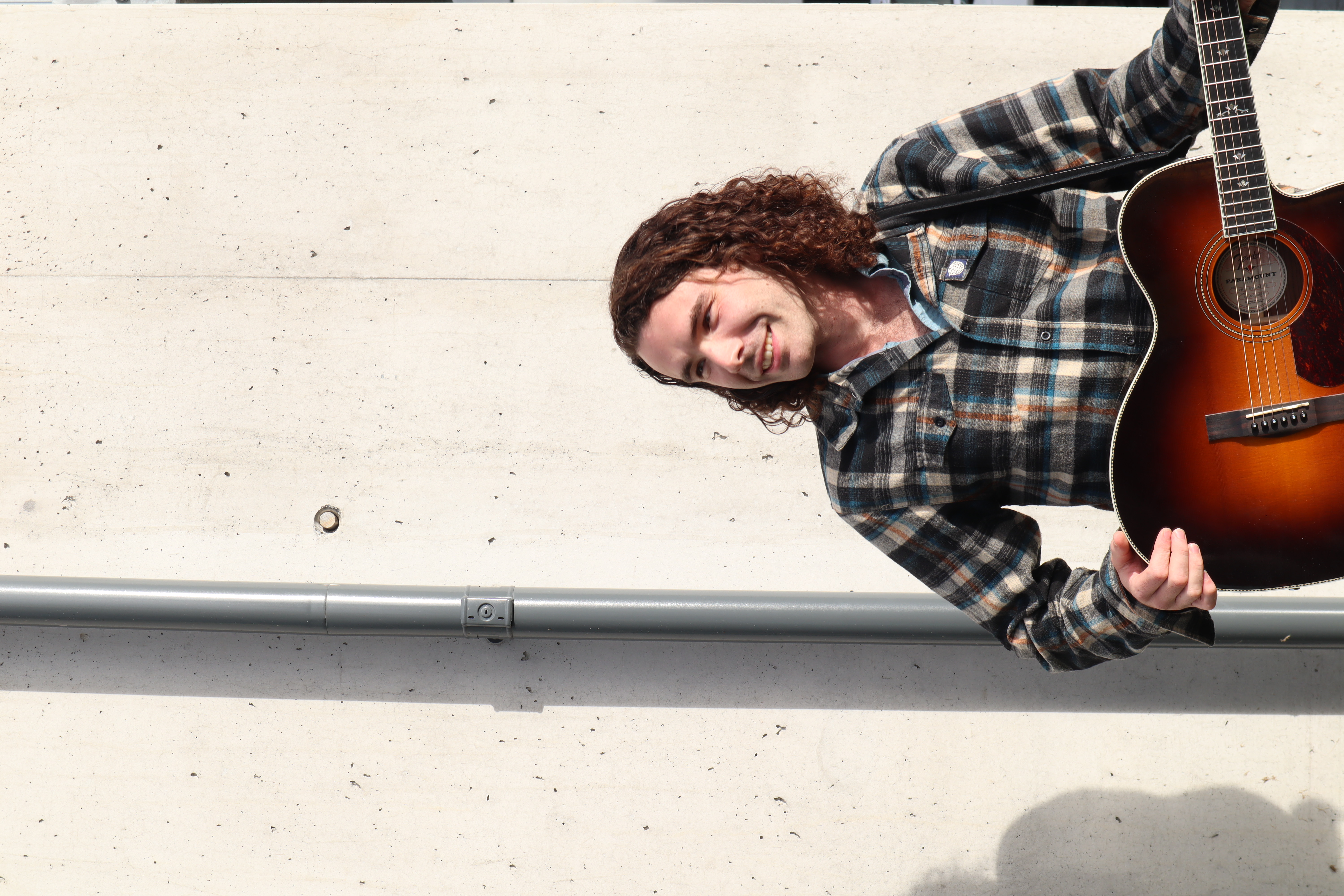 Logan Carlstrom with guitar